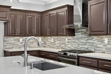 Welcome to this beautifully upgraded home located on a spacious - photo 18