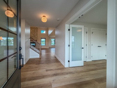 Experience luxury waterfront living in this stunning new - photo 6