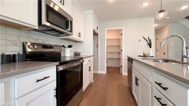 Why wait to build when you can move into this sleek - photo 11