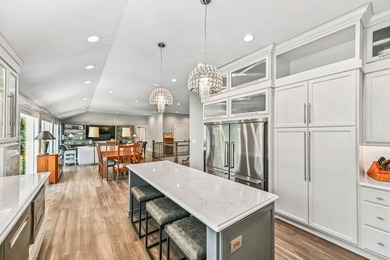 Fully renovated in 2022, this luxurious 4BR, 4.5BA lakefront - photo 12