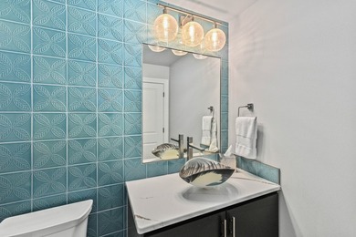 Fully renovated in 2022, this luxurious 4BR, 4.5BA lakefront - photo 14