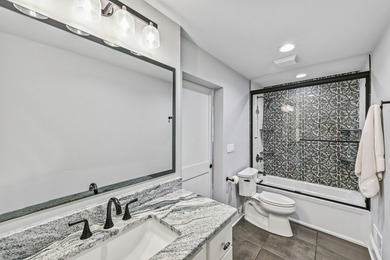 Fully renovated in 2022, this luxurious 4BR, 4.5BA lakefront - photo 21