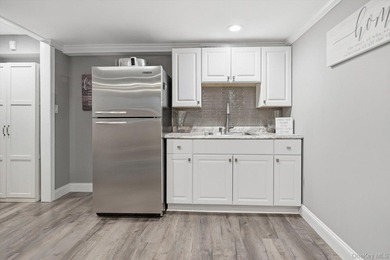 Welcome to this MINT Cape Cod-style home nestled in the heart of - photo 31