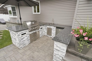 Welcome to this MINT Cape Cod-style home nestled in the heart of - photo 42