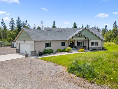 Enjoy the best of North Idaho living on 10 private acres with - photo 3