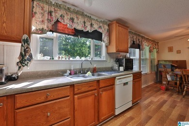 TUCKED away with privacy, this home sits on 3 acres with room to - photo 13