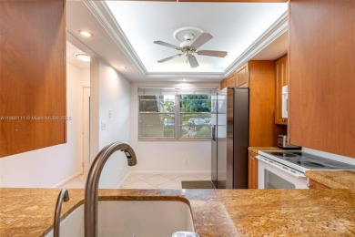 Lake Condo For Sale in Coconut Creek, Florida