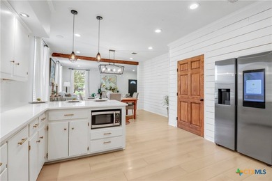 This mid-century cottage has been tastefully updated to include - photo 11