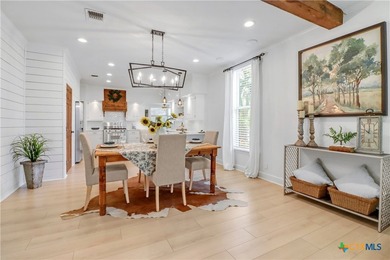 This mid-century cottage has been tastefully updated to include - photo 12