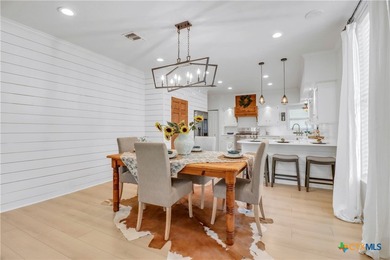 This mid-century cottage has been tastefully updated to include - photo 13