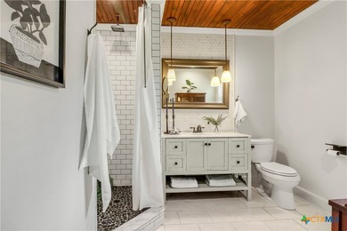 This mid-century cottage has been tastefully updated to include - photo 21