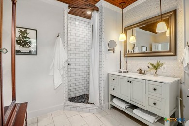 This mid-century cottage has been tastefully updated to include - photo 22