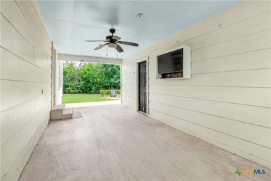 This mid-century cottage has been tastefully updated to include - photo 31
