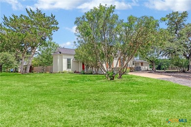 This mid-century cottage has been tastefully updated to include - photo 34