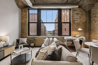 Welcome to Harvester Lofts, one of the most iconic residential - photo 2