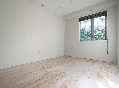 Welcome to Residence B2B, a three-bedroom, one-bath condominium - photo 4
