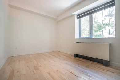 Welcome to Residence B2B, a three-bedroom, one-bath condominium - photo 6