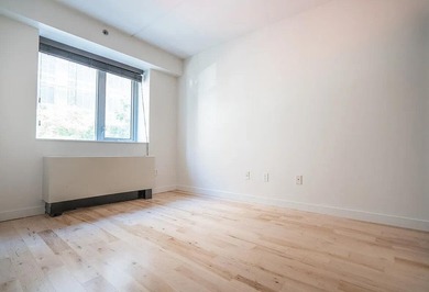 Welcome to Residence B2B, a three-bedroom, one-bath condominium - photo 8