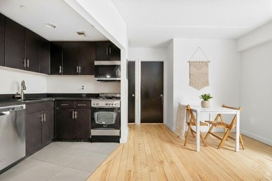 Welcome to Residence B2B, a three-bedroom, one-bath condominium - photo 9
