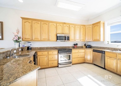 Experience lagoonfront living in Gulf Shores at 2424 West Beach - photo 40