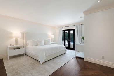 Located on a quiet street in Palm Beach's North End, this modern - photo 7