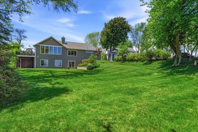 This prime Lake Michigan waterfront property on the sought-after - photo 4