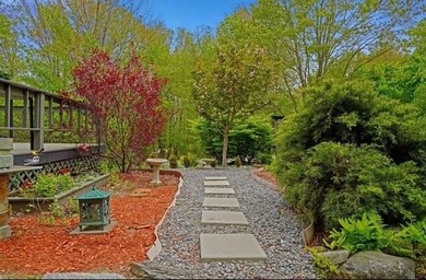 Welcome home to this delightful 3 bedroom, 2 1/2-bath Cape Cod - photo 3