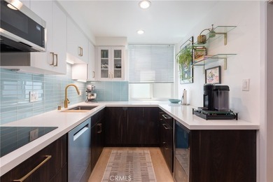 Welcome to this beautifully remodeled condominium in the highly - photo 19