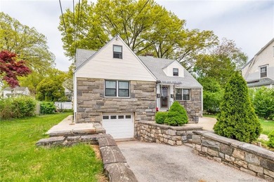 This beautifully renovated two-family home in a highly desirable - photo 1