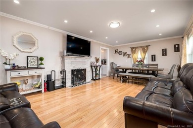 This beautifully renovated two-family home in a highly desirable - photo 2