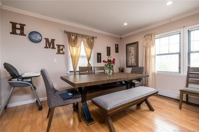 This beautifully renovated two-family home in a highly desirable - photo 3