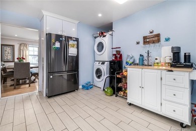 This beautifully renovated two-family home in a highly desirable - photo 9