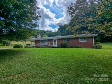 Well Built Brick Home in the South Toe Community..is Great Place