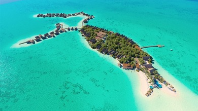 Experience the pinnacle of island luxury with this exceptionally - photo 2