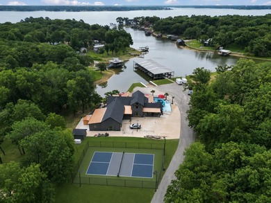 Experience luxury lakefront living at its finest in this - photo 1