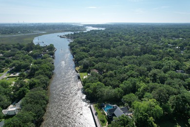 Rare opportunity to own a large 1.5-acre waterfront lot on - photo 14