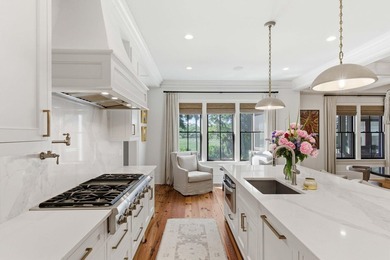Nestled beneath a canopy of majestic live oaks within the - photo 21