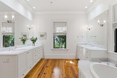 Nestled beneath a canopy of majestic live oaks within the - photo 31