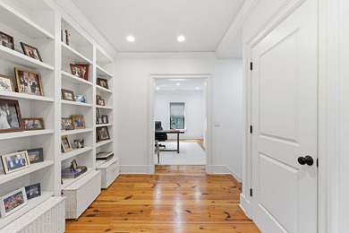 Nestled beneath a canopy of majestic live oaks within the - photo 42
