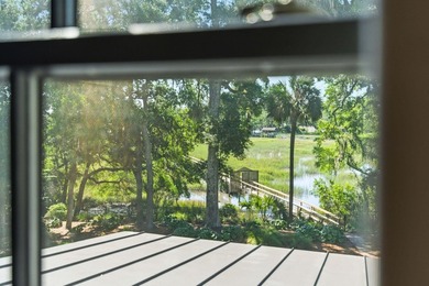 Nestled beneath a canopy of majestic live oaks within the - photo 48