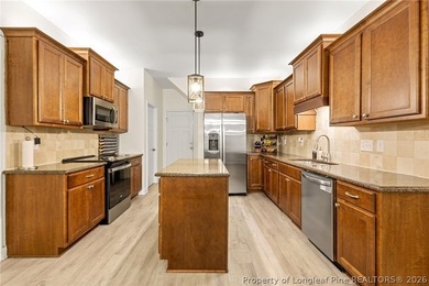 Welcome to the gated community of Carolina Trace! With over 2 - photo 9