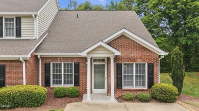 Charming end-unit townhome with a layout that lives large and - photo 1