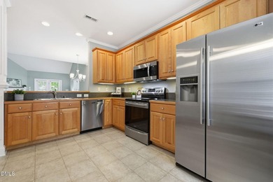 Charming end-unit townhome with a layout that lives large and - photo 4