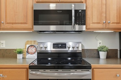 Charming end-unit townhome with a layout that lives large and - photo 5
