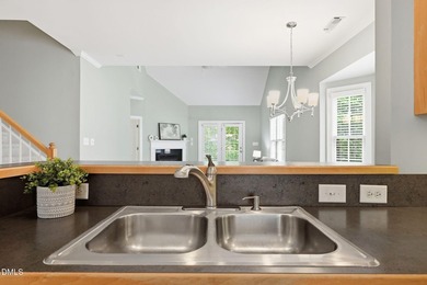 Charming end-unit townhome with a layout that lives large and - photo 6