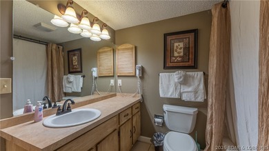 Located in the sought-after golf cart community of Tan Tar A - photo 17