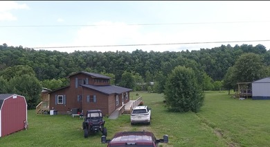 SPRING RIVER FRONT HOME - Rustic 3 bedroom, 2 bath home on - photo 29