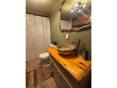 Tucked away in the hills of Southeastern Oklahoma, next to - photo 35