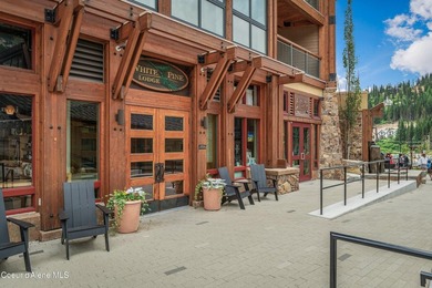 ucked in the heart of Schweitzer Village, this two-bedroom - photo 1