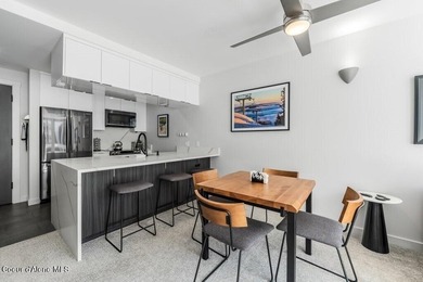 ucked in the heart of Schweitzer Village, this two-bedroom - photo 3